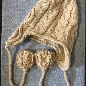 Toque with Tasseled Strings